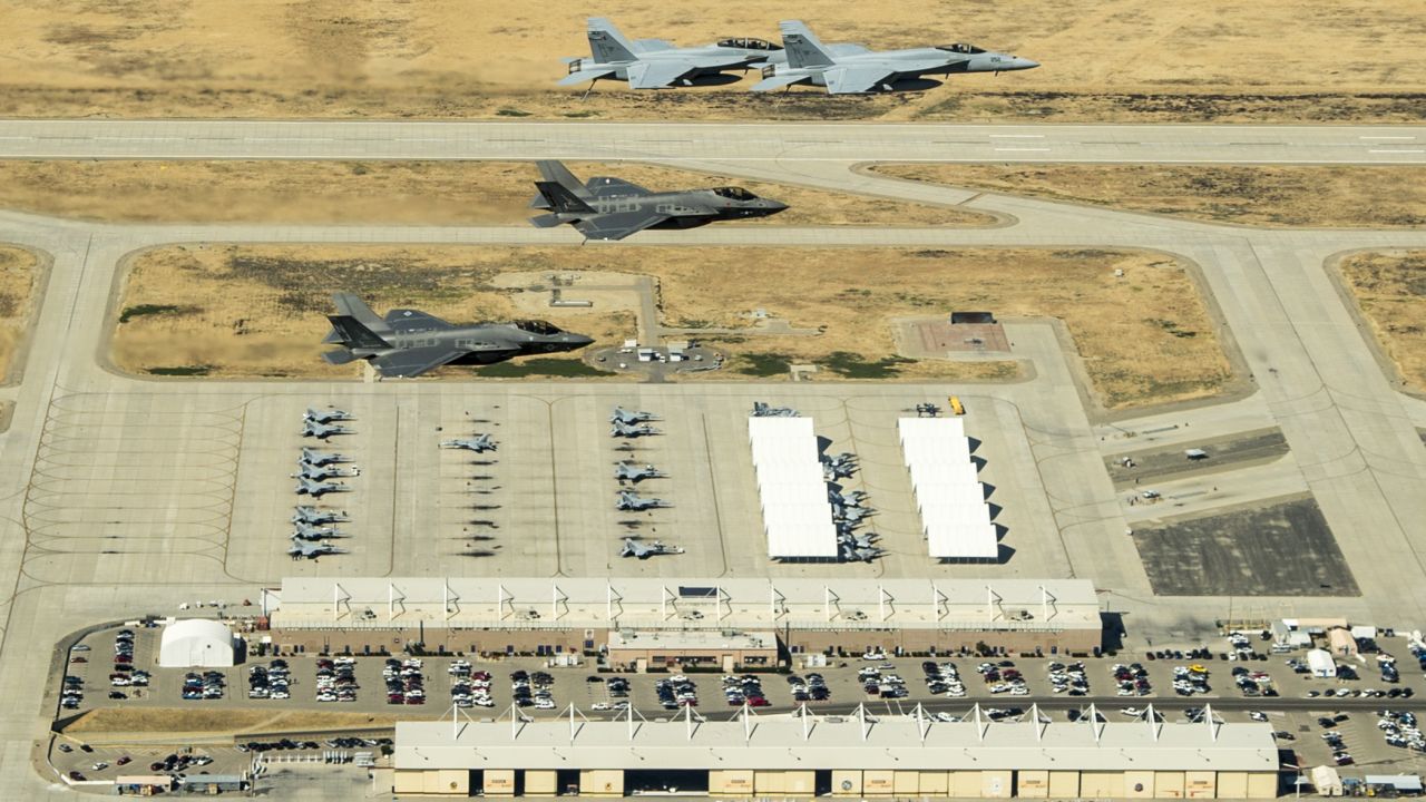 F-35C Lightning II aircraft fly in formation over the naval base with F/A-18E/F Super Hornets last year.