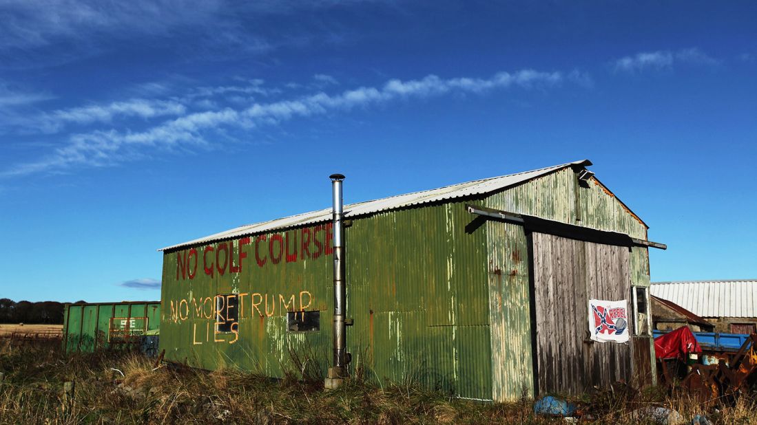 Here, Scottish folk touched by Trump's economic investment in their community, leave messages of thanks daubed on shed.