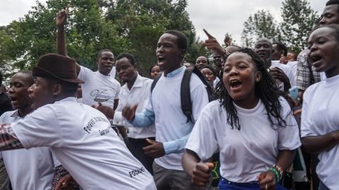 Garissa University College attack survivors sang out Saturday during a procession through their new campus.