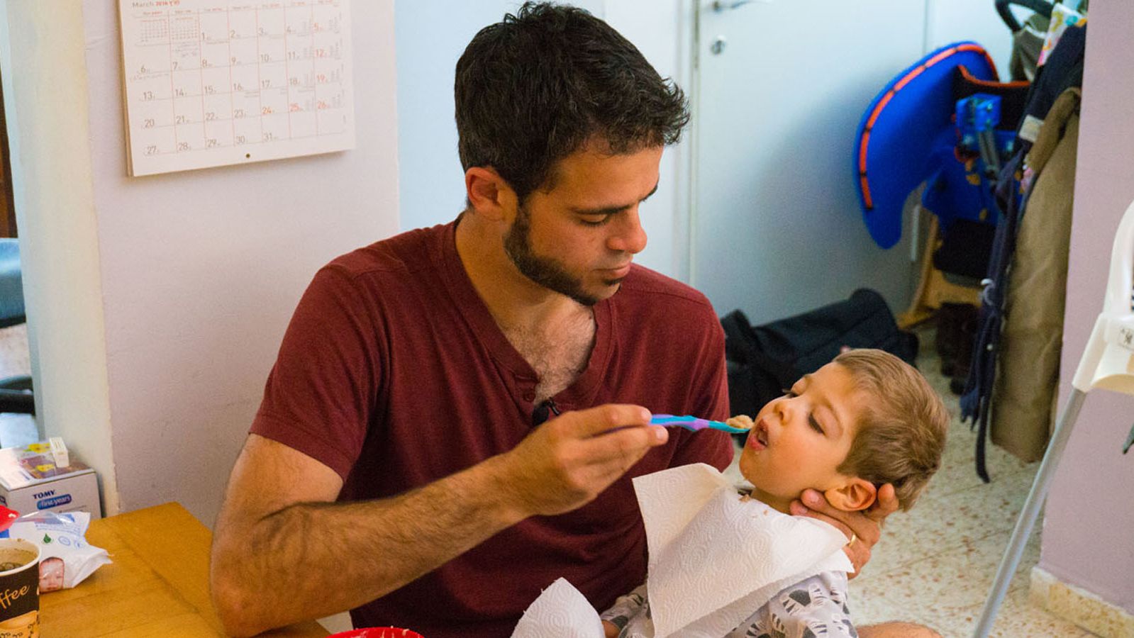 Asaf Parush administers medical cannabis oil to his son Lavie to treat his epilepsy.