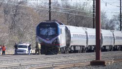 CHESTER, PA - APRIL 3:  Emergency personnel investigate the crash site of Amtrak Palmetto train 89 on April 3, 2016 in Chester, Pennsylvania.  Two people are confirmed dead after the lead engine of the train struck a backhoe that was on the track south of Philadelphia, according to published reports. Approximately 341 passengers and seven crew members were onboard the train, which was traveling from New York to Savannah, according to Amtrak.  (Photo by Mark Makela/Getty Images)