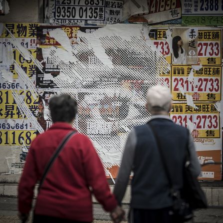 Portuguese street artist Vhils has taken over a Hong Kong streets and rooftops to display his 'Debris' exhibition. 