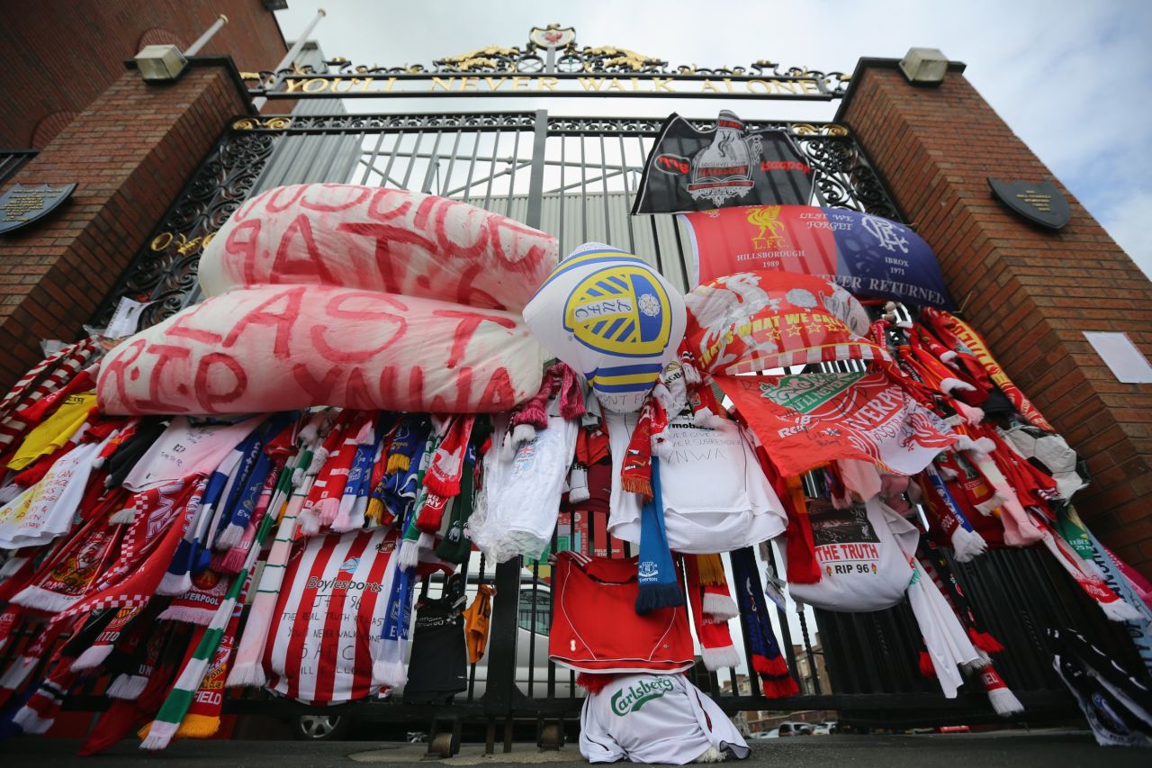 Tributes are left at Anfield's Bill Shankly gates in 2012, soon after the Hillsborough Independent Panel had revealed its findings.