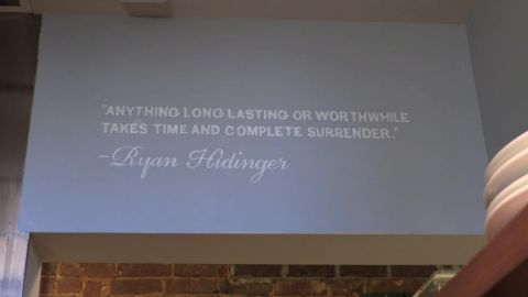 A quote from Ryan Hidinger on the wall at the Staplehouse restaurant.