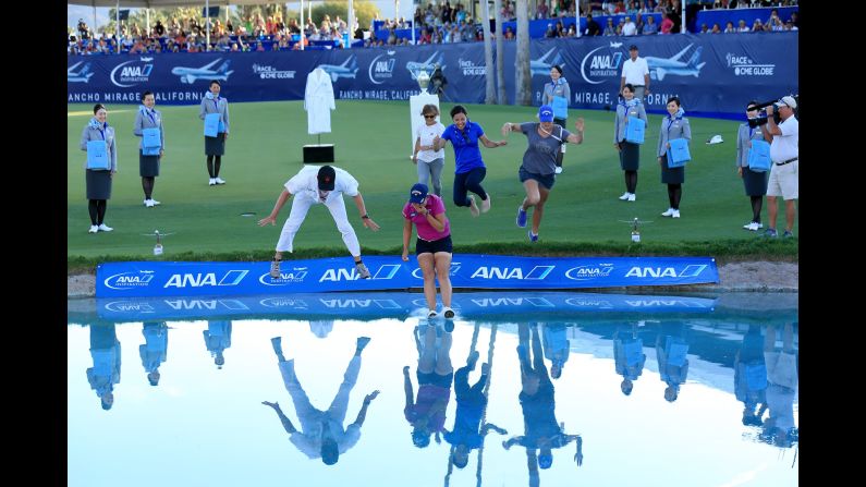 Lydia Ko leads the leap into Poppie's Pond after winning the ANA Inspiration, a golf tournament in Rancho Mirage, California, on Sunday, April 3. It's the <a href="index.php?page=&url=http%3A%2F%2Fwww.cnn.com%2F2016%2F04%2F04%2Fgolf%2Flydia-ko-golf-ana-inspiration-california-lpga%2Findex.html" target="_blank">second major in a row</a> for Ko, an 18-year-old from New Zealand who won the Evian Championship in September.
