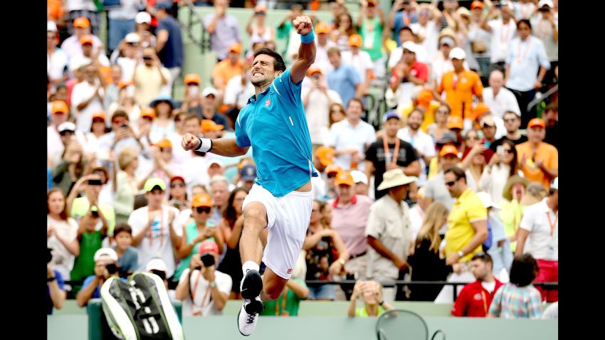 KEY BISCAYNE, FL - APRIL 03:  Novak Djokovic of Serbia celebrates his win over Kei Nishikori of Japan during the final on Day 14 of the Miami Open presented by Itau at Crandon Park Tennis Center on April 3, 2016 in Key Biscayne, Florida.  (Photo by Matthew Stockman/Getty Images)