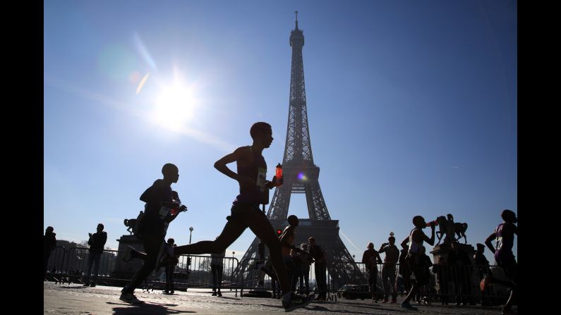 Runners participate in the Paris Marathon on Sunday, April 3.