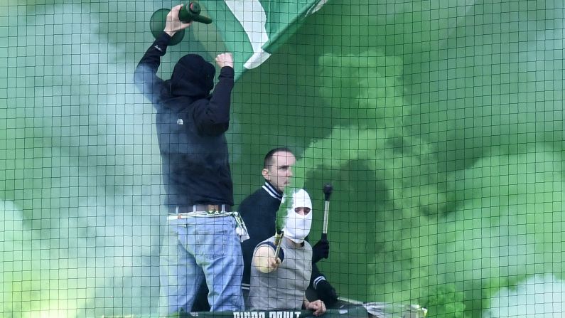 Fans of Werder Bremen support their soccer club during a German league match at Borussia Dortmund on Saturday, April 2.