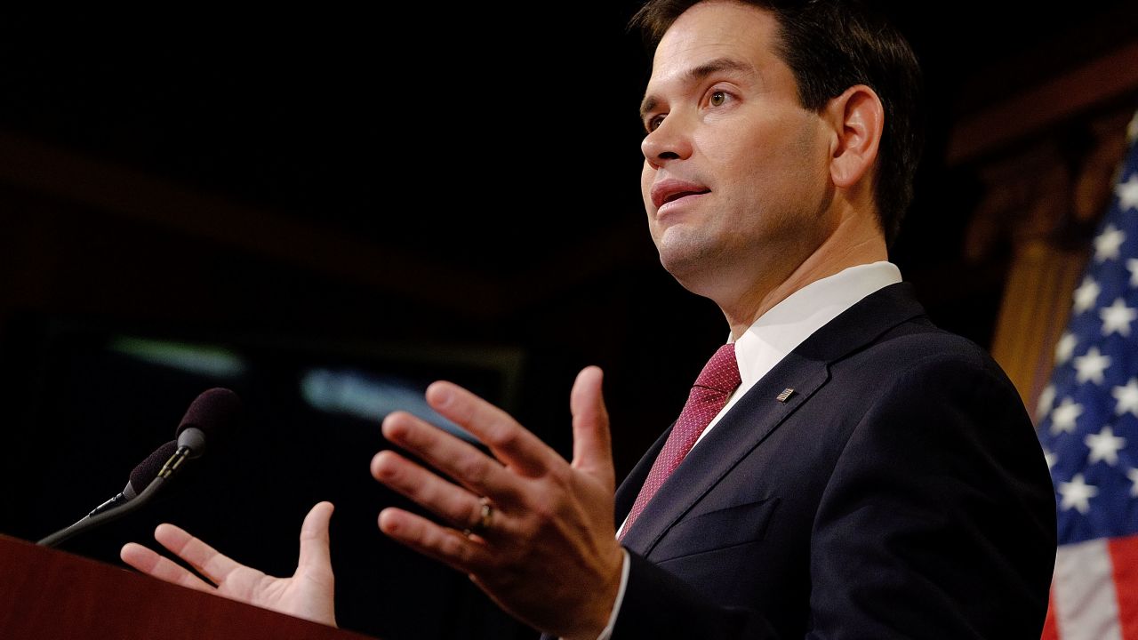 Sen. Marco Rubio (R-FL) reacts to U.S. President Barack Obama's announcement about revising policies on U.S.-Cuba relations on December 17, 2014 in Washington, DC.