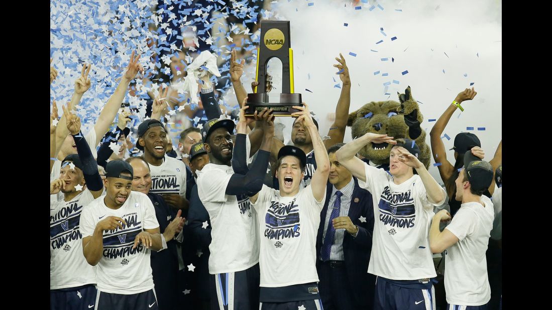 Villanova players celebrate after defeating North Carolina in the NCAA tournament final on Monday, April 4. The Wildcats won 77-74 on a buzzer-beating 3-pointer by junior forward Kris Jenkins.