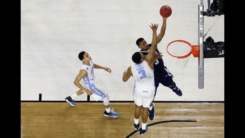 Villanova's Phil Booth shoots over Kennedy Meeks.