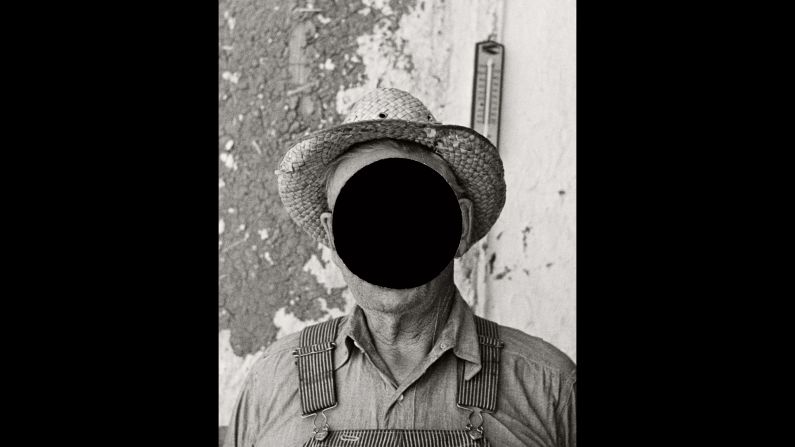 A black hole obscures the face of a North Dakota farmer in this photo taken by Russell Lee in 1937. Lee was one of many famous photographers who were commissioned by the Farm Security Administration to document poor farmers and their lands during the Great Depression. The man who led the FSA's photography division, Roy Stryker, would punch holes in the negatives that were not to be used, but many of these images are available today through the Library of Congress. <a href="index.php?page=&url=https%3A%2F%2Fdaylightbooks.org%2Fproducts%2Fground" target="_blank" target="_blank">"Ground,"</a> a new photo book assembled by Bill McDowell, takes a closer look at this hole-punched history.
