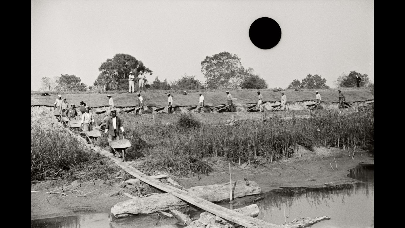Men work on a levee in Louisiana in 1935. "The photographs in 'Ground' speak to our contest with different forces: nature, the government, the dynamics between people of different classes and races," McDowell said in an interview with DJ Hellerman, curator and director of exhibitions at Burlington City Arts in Burlington, Vermont. "They speak to now even as they confer meaning on the past. Damaged and bountiful land; drought, flood and exodus. Starting over. Repeating the past."