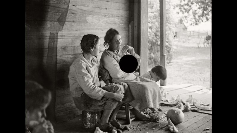 This shot was taken in Alabama in 1936. "Much as many families who lived through the Great Depression sought to make use of every scrap of food, clothing, or other material resource, McDowell has fashioned his contemporary creative endeavor from that which has been cast off, and in so doing has discovered a way to achieve common ground between images others created in the past and the ones he has printed for the first time in the present," Reynolds wrote in the book.