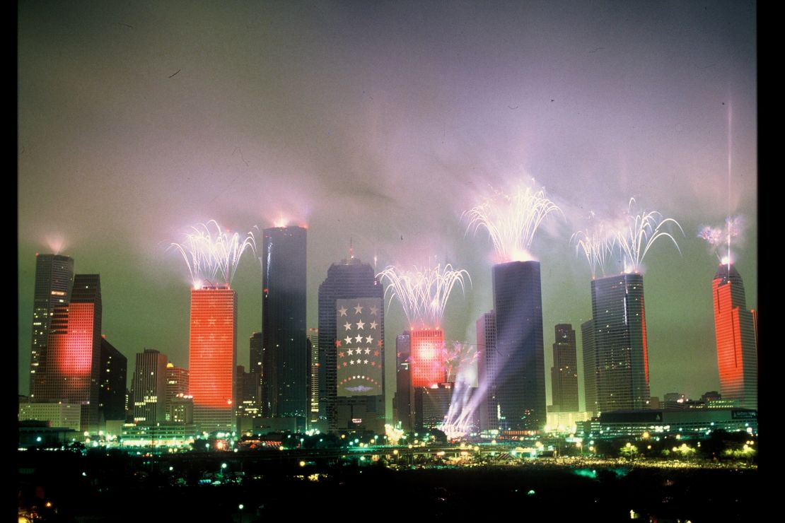 Fireworks explode off Houston's skyscrapers during Jean-Michel Jarre's record-breaking show.