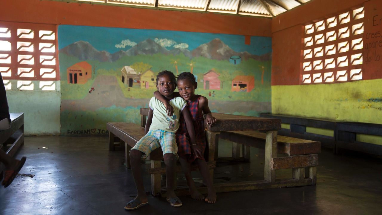 The Joan Rose Foundation was still operating in Esperanza when CNN visited last year. Here, two students are in the foundation's dining room. Virtually all of the foundation's students are Dominicans of Haitian descent; that is, children born in the Dominican Republic to immigrant parents. The school is where they come for education, food and sanctuary.
