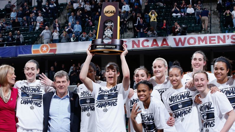 The Connecticut Huskies celebrate after their 82-51 victory over the Syracuse Orange to win the NCAA women's basketball championship on Tuesday, April 5. UConn now has 11 titles, all under head coach Geno Auriemma.