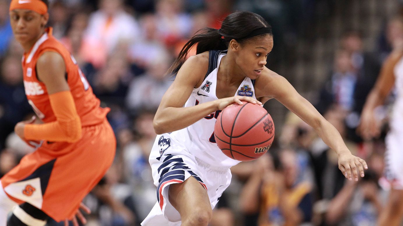 Connecticut guard Moriah Jefferson dribbles the ball past Syracuse guard Brittney Sykes.