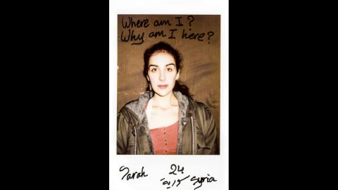 "Where am I? Why am I here?" asks Sarah, a 24-year-old Syrian refugee who was recently photographed by Charlotte Schmitz. Schmitz used a Polaroid camera so her subjects could write their thoughts directly onto the photos. "Everyone could tell freely what he or she thinks or feels," she said. 