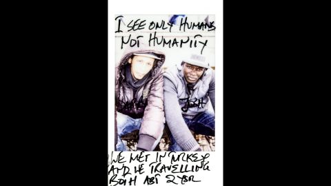 "I see only humans, not humanity," it says on this photo of Dappy and Josh. They met in Turkey and have been traveling together for about two years.