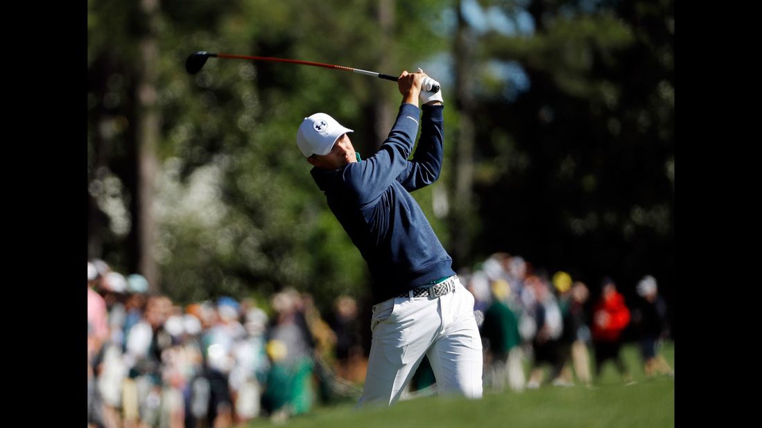 Spieth hits a shot during the first round on Thursday, April 7. Spieth shot a 6-under 66 to lead the tournament by two strokes heading into Friday.