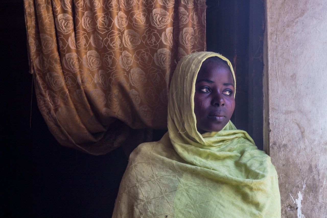 "The Boko Haram terrorists went away with two of my siblings and my brother was shot on our way to Maiduguri. Even after finding safety here, we have lots of problems. Food, rent. We've too (many) issues. And there's not much trade. I sew caps but sometimes you can't even buy the thread because there's no money. The government and NGO food distribution is yet to reach our neighborhood."