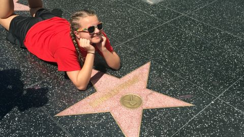 Many tourists enjoyed posing beside the Trump star.