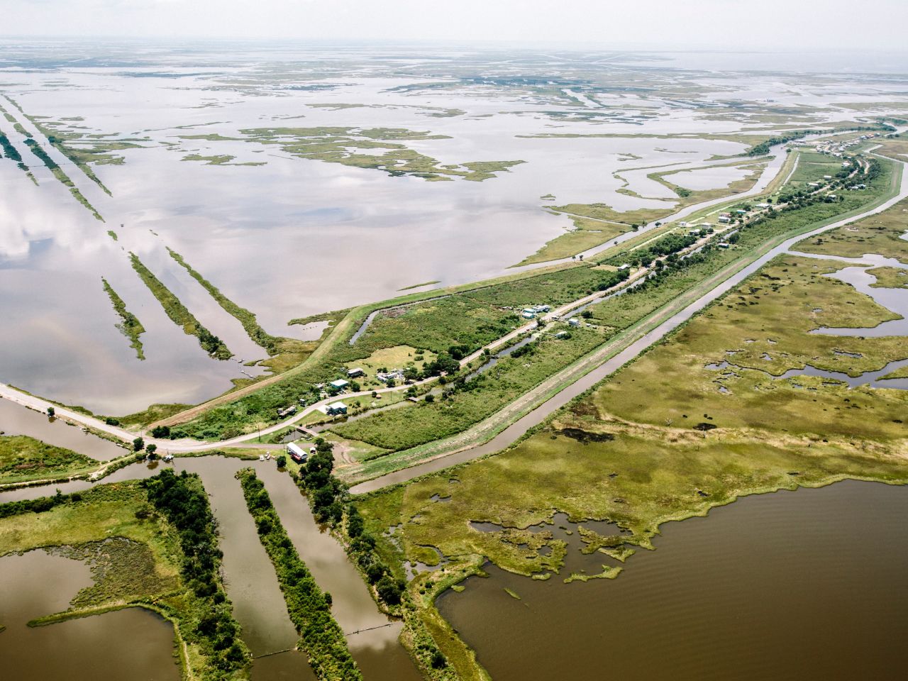The community of Isle de Jean Charles, Louisiana, shown here in 2015, is disappearing in part because of poor river management and climate change.