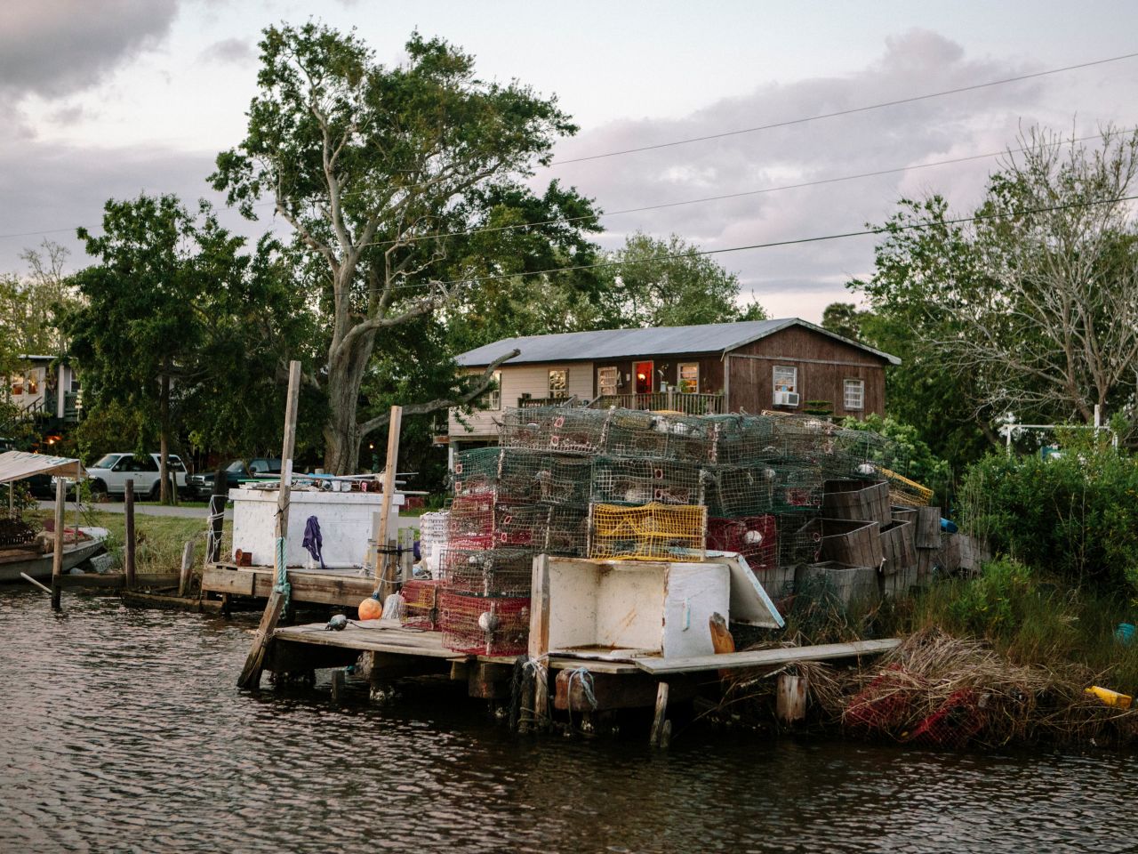 Crab traps are stacked on a dock on Bayou Pointe-aux-Chenes, which is near Isle de Jean Charles.