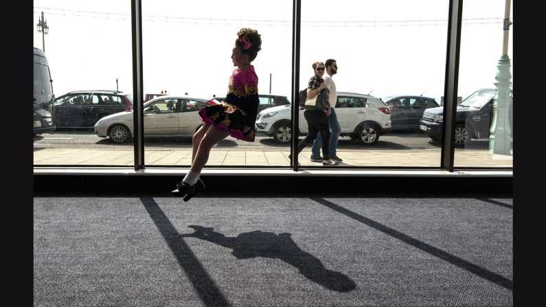 A girl practices in a hallway during the World Irish Dance Championships, which continued in Brighton, England, on Saturday, April 2.