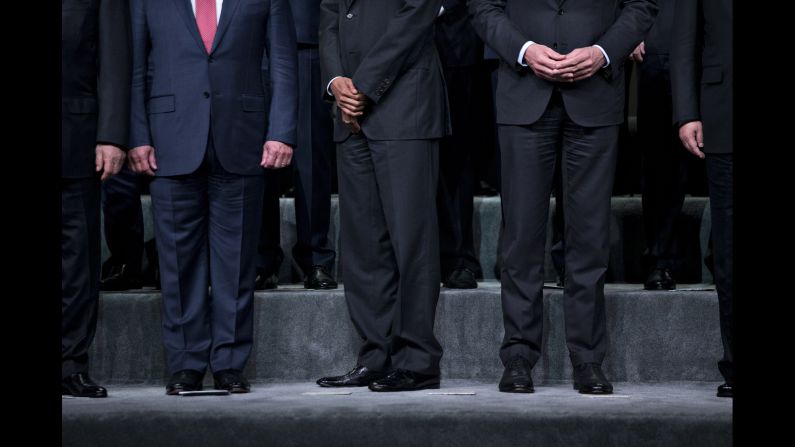 U.S. President Barack Obama, center, is flanked by Jordan's King Abdullah, left, and Dutch Prime Minister Mark Rutte during a group photo at the Nuclear Security Summit on Friday, April 1. The summit was held in Washington.