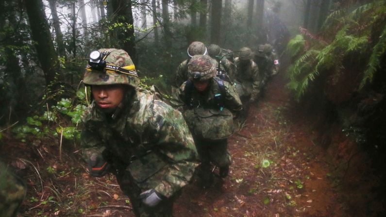 Japanese troops climb a mountain Thursday, April 7, to search for a military jet that disappeared over the city of Kagoshima. At least four bodies have been found in the wreckage, <a href="http://www.japantoday.com/category/national/view/wreckage-of-sdf-jet-found-on-kagoshima-mountain-6-feared-dead" target="_blank" target="_blank">according to the Kyodo News Agency.</a>