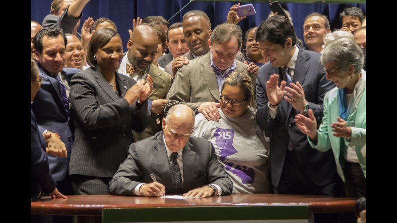 California Gov. Jerry Brown signs legislation Monday, April 4, that makes his state <a href="http://money.cnn.com/2016/03/31/pf/california-minimum-wage/" target="_blank">the first in the nation</a> to raise the minimum wage to $15 an hour.