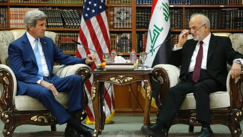 Iraq's Foreign Minister Ibrahim al-Jaafari receives U.S. Secretary of State John Kerry in the library at the foreign minister's villa in Baghdad on April 8, 2016. 