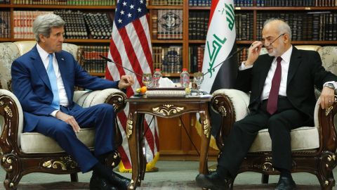 Iraq's Foreign Minister Ibrahim al-Jaafari receives U.S. Secretary of State John Kerry in the library at the foreign minister's villa in Baghdad on April 8, 2016.
