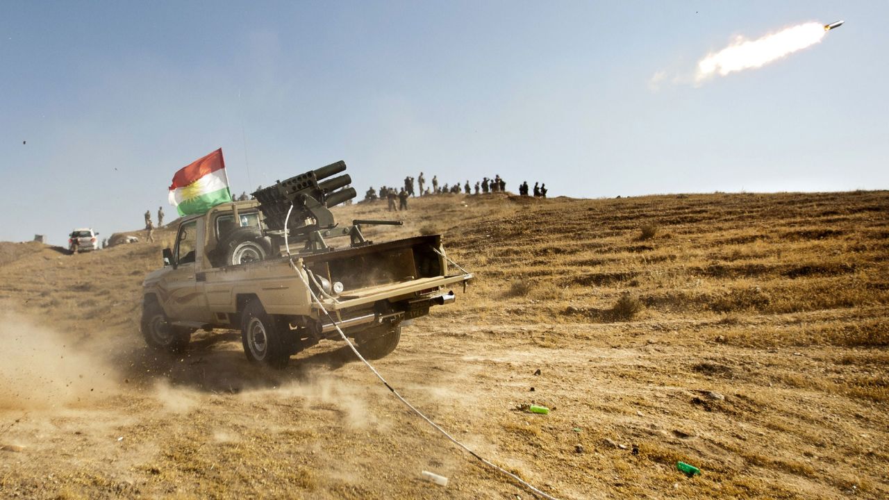 Kurdish Peshmerga fighters fire missiles during clashes with ISIS in Jalawla, Iraq, on June 14, 2014. That month, ISIS took control of Mosul and Tikrit, two major cities in northern Iraq.