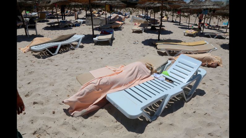 Dead bodies lie near a beachside hotel in Sousse, Tunisia, after <a href="index.php?page=&url=http%3A%2F%2Fwww.cnn.com%2F2015%2F06%2F26%2Fworld%2Fgallery%2Ftunisia-terrorist-attack%2Findex.html" target="_blank">a gunman opened fire</a> on June 26, 2015. ISIS claimed responsibility for the attack, which killed at least 38 people and wounded at least 36 others, many of them Western tourists. Two U.S. officials said they believed the attack might have been inspired by ISIS but not directed by it.