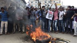 Bangladeshi students block the road and stage a protest following the murder of a law student, hacked to death by four assailants the night before, in Dhaka on April 7, 2016.
A Bangladeshi law student who posted against Islamism on his Facebook page has been murdered, police said on April 7, the latest in a series of killings of secular activists and bloggers in the country. / AFP / Munir UZ ZAMAN        (Photo credit should read MUNIR UZ ZAMAN/AFP/Getty Images)