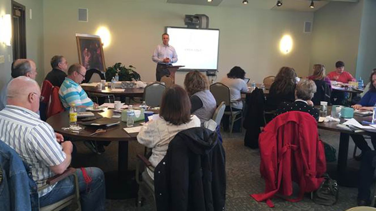 Vince Frese speaks to divorced Catholics at a retreat held by the Diocese of Toledo. 