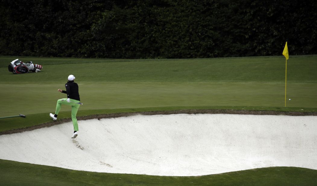 Jamie Donaldson climbs out of a bunker on the fourth hole Sunday. 