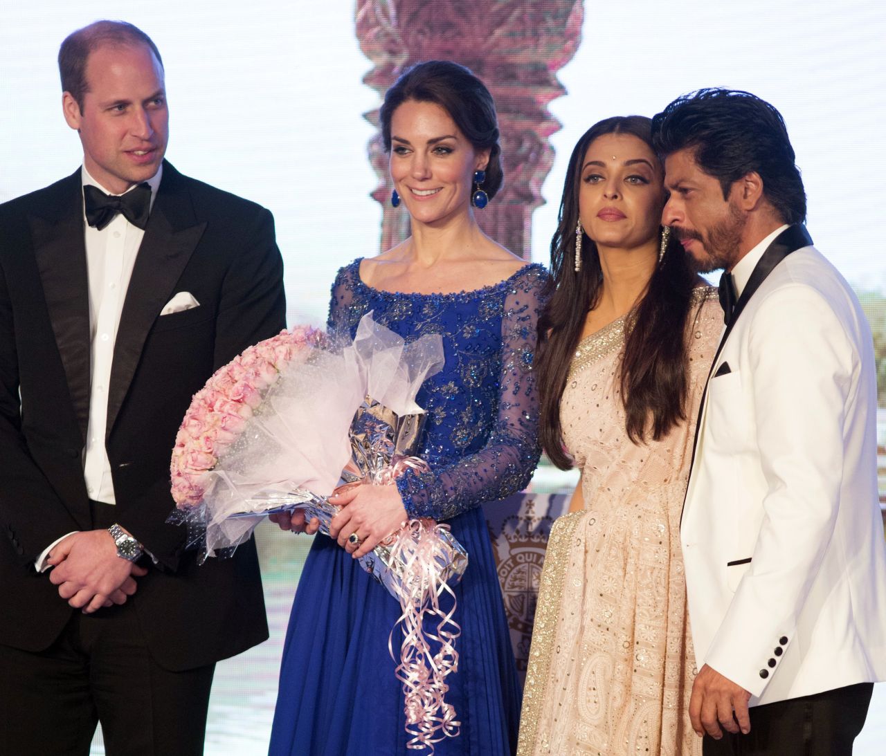The royal couple poses on stage with actors Aishwarya Rai Bachchan, third from left, and Shah Rukh Khan at a Bollywood Charity Gala in Mumbai on April 10.