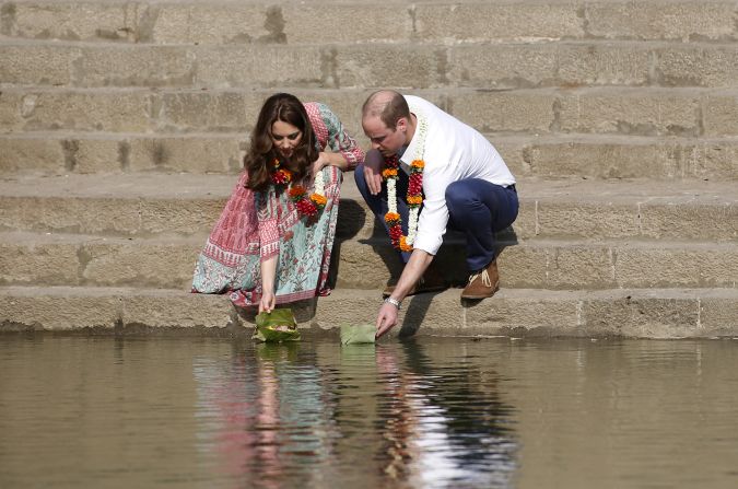 The royal couple floats flowers at the Banganga Water Tank in Mumbai on April 10.
