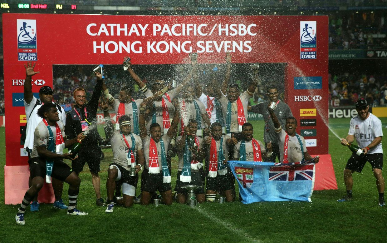 Fiji players celebrate after retaining the Hong Kong Sevens title with a convincing 21-7 victory over New Zealand in the final. 
