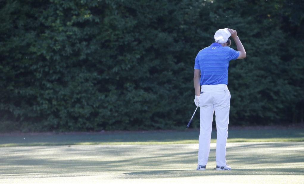 Spieth, the defending champion, was comfortably in first until the 12th hole, when he hit the ball into the water twice and finished with a quadruple-bogey.