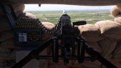 Machine gun manned by Peshmerga fighters at the defensive line just outside al-Nasir village.