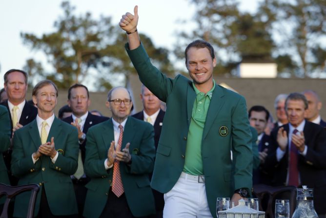 Danny Willett gives the crowd a thumbs-up after he won the Masters tournament Sunday, April 10. Willett shot a 5-under 67 to win the tournament by three strokes over Jordan Spieth and Lee Westwood. He is the first Englishman to win the Masters since Nick Faldo in 1996. <a href="index.php?page=&url=http%3A%2F%2Fedition.cnn.com%2Fspecials%2Fgolf%2Fthe-clubhouse" target="_blank">Follow CNN's live Masters blog</a>