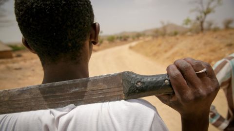 Vigilantes at a checkpoint outside Baigai, Cameroon say Boko Haram's tactics have changed the way they perceive strangers. 