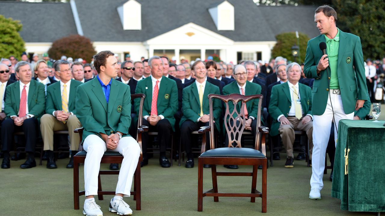 Willett commiserates with Jordan Spieth after receiving his green jacket from the defending champion. 