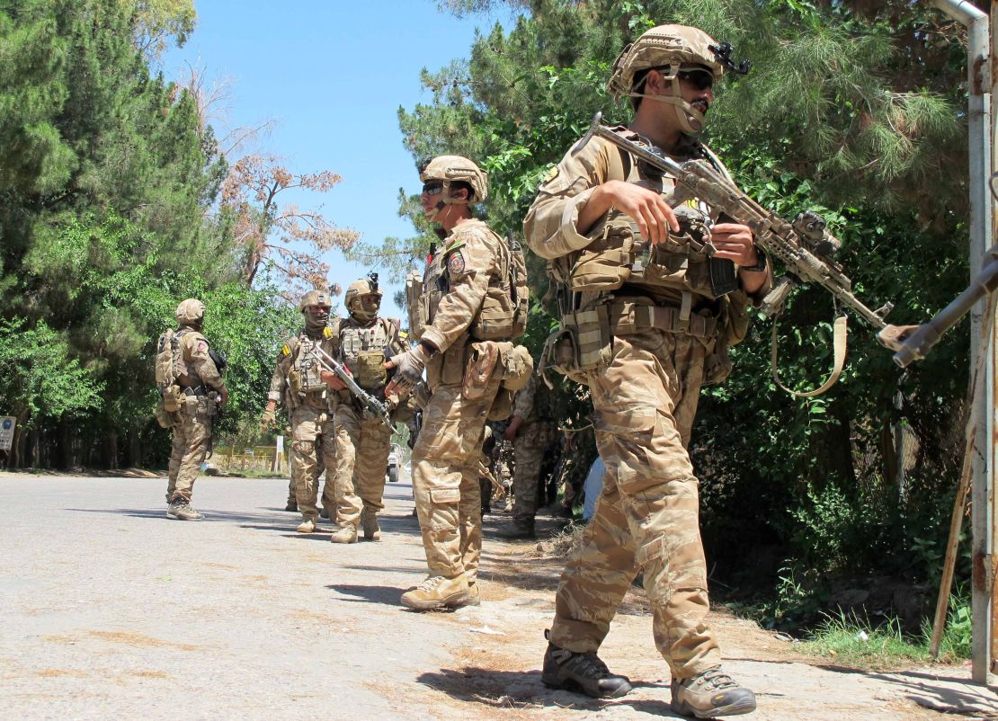 Afghan army soldiers patrol in Lashkar Gah, Helmand province.