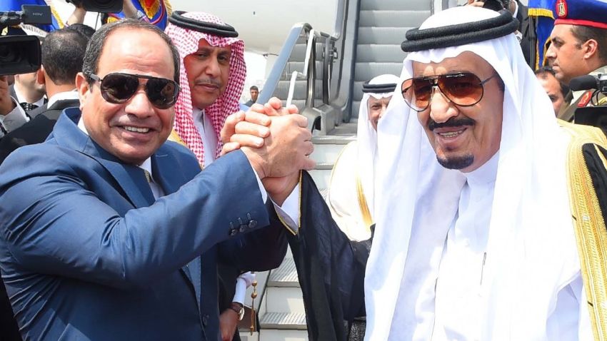 Saudi King Salman (R) shaking hands with Egyptian President Abdel Fattah al-Sisi before leaving Cairo's international airport on April 11, 2016.